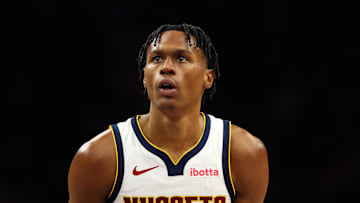 Nov 29, 2025; Phoenix, Arizona, USA; Denver Nuggets guard Peyton Watson (8) against the Phoenix Suns at the Mortgage Matchup Center. Mandatory Credit: Mark J. Rebilas-Imagn Images