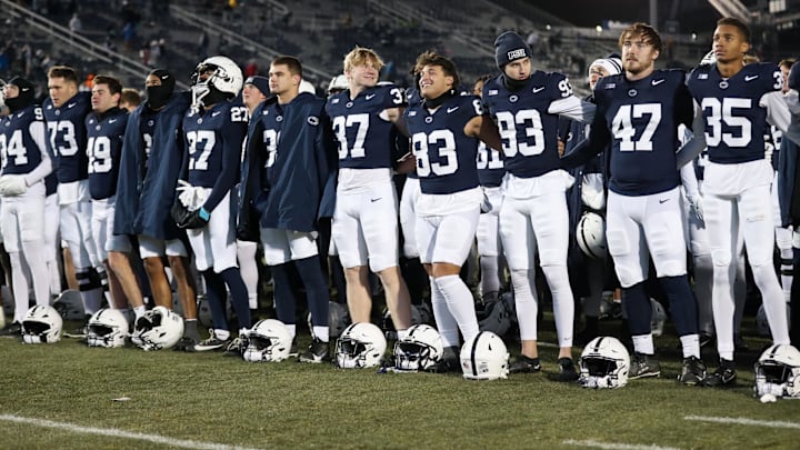 Penn State Nittany Lion players sing their alma mater