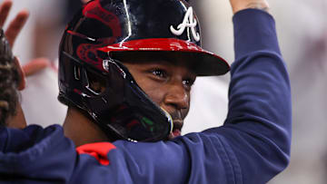 Atlanta Braves center fielder Michael Harris II (23) celebrates with teammates after driving in a run against the St. Louis Cardinals in the eighth inning at Truist Park.