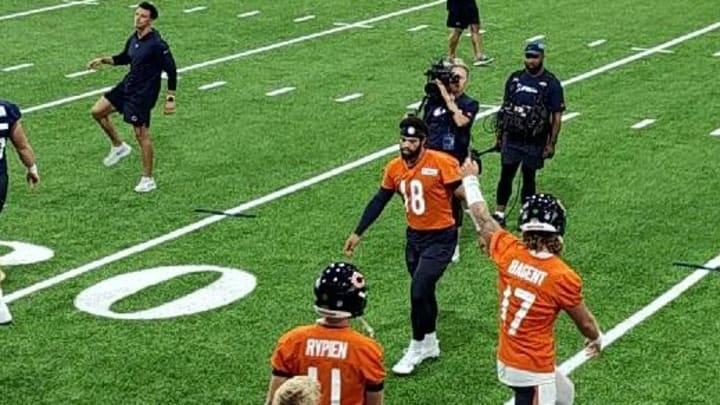 Caleb Williams and QBs got through Monday's stretching at the Walter Payton Center after rain forced practice indoors.