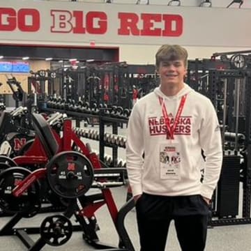 2027 tight end prospect Jack Brown poses in the Nebraska weight room during a visit to Lincoln.