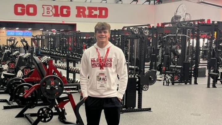 2027 tight end prospect Jack Brown poses in the Nebraska weight room during a visit to Lincoln.