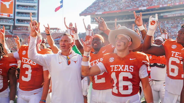 Aug 31, 2024; Austin, Texas, USA; Texas Longhorns head coach Steve Sarkisian sings the alma matter with his players after def