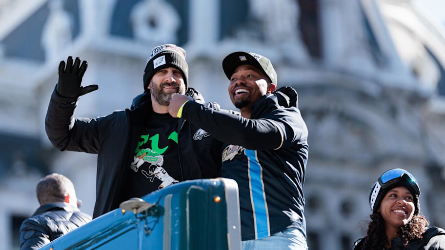 Nick Sirianni (left) celebrates with Kenneth Gainwell during the Eagles' championship parade. | Caean Couto-Imagn Images