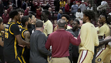 Jan 15, 2025; Tallahassee, Florida, USA; Florida State Seminoles and Pittsburgh Panthers players react after the game at Donald L. Tucker Center. Mandatory Credit: Melina Myers-Imagn Images