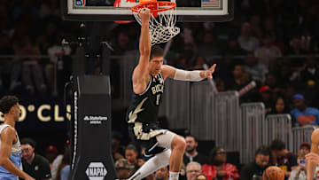 Feb 7, 2025; Atlanta, Georgia, USA; Milwaukee Bucks center Brook Lopez (11) dunks against the Atlanta Hawks in the third quarter at State Farm Arena. Mandatory Credit: Brett Davis-Imagn Images