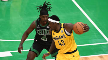 May 23, 2024; Boston, Massachusetts, USA; Indiana Pacers forward Pascal Siakam (43) dribbles the ball against Boston Celtics guard Jrue Holiday (4) in the first half during game two of the eastern conference finals for the 2024 NBA playoffs at TD Garden. Mandatory Credit: Brian Fluharty-USA TODAY Sports