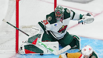 Apr 29, 2025; Las Vegas, Nevada, USA; Minnesota Wild goaltender Marc-Andre Fleury (29) makes a save against the Vegas Golden Knights during an overtime period in game five of the first round of the 2025 Stanley Cup Playoffs at T-Mobile Arena. Mandatory Credit: Stephen R. Sylvanie-Imagn Images