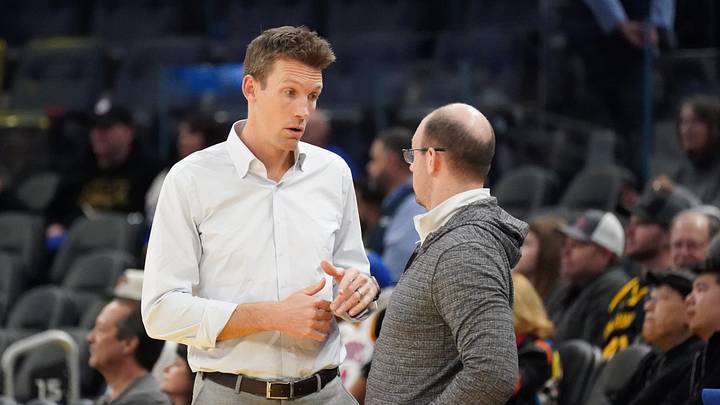 San Francisco, California, USA;  Golden State Warriors general manager Mike Dunleavy chats before the game against the Memphis Grizzlies at Chase Center. Mandatory Credit: David Gonzales-Imagn Images