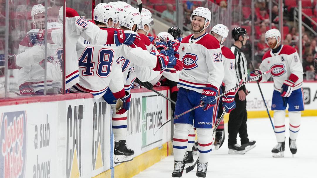 May 21, 2026; Raleigh, North Carolina, USA; Montreal Canadiens left wing Juraj Slafkovsky (20) celebrates with teammates after scoring a goal against the Carolina Hurricanes during the third period in game one of the Eastern Conferene Final of the 2026 Stanley Cup Playoffs at Lenovo Center. Mandatory Credit: James Guillory-Imagn Images