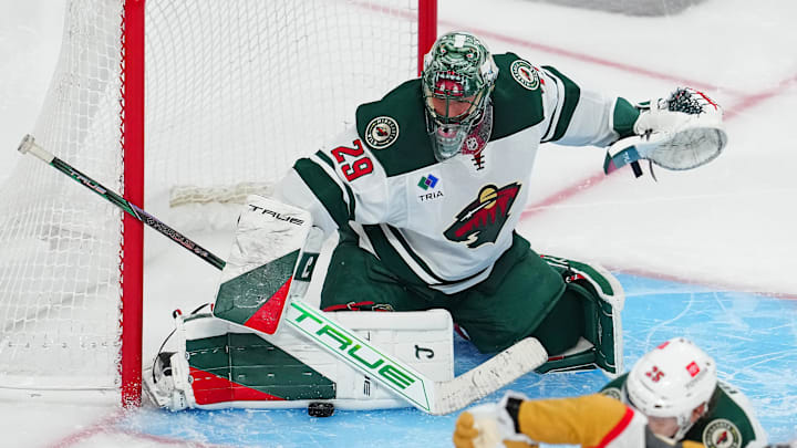 Apr 29, 2025; Las Vegas, Nevada, USA; Minnesota Wild goaltender Marc-Andre Fleury (29) makes a save against the Vegas Golden Knights during an overtime period in game five of the first round of the 2025 Stanley Cup Playoffs at T-Mobile Arena. Mandatory Credit: Stephen R. Sylvanie-Imagn Images
