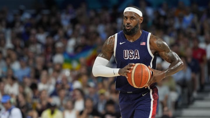 Aug 3, 2024; Villeneuve-d'Ascq, France; United States guard LeBron James (6) passes during the first quarter against Puerto Rico during the Paris 2024 Olympic Summer Games at Stade Pierre-Mauroy. Mandatory Credit: John David Mercer-USA TODAY Sports