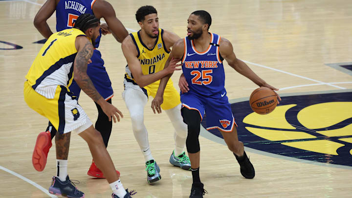 New York Knicks forward Mikal Bridges drives to the hoop past Indiana Pacers star Tyrese Haliburton during the NBA Playoffs New York Knicks forward Mikal Bridges drives to the hoop past Indiana Pacers star Tyrese Haliburton during the NBA Playoffs