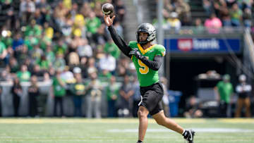Fighting Ducks quarterback Dante Moore throws out a pass as the Fighting Ducks face off against Mighty Oregon in the Oregon Ducks spring game on April 26, 2025, at Autzen Stadium in Eugene.