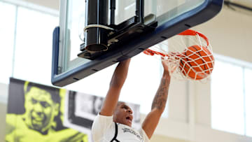 July 16, 2025; North Augusta, South Carolina, USA; MoKan Trent Perry (11) dunks the ball during the MoKan and Team Thad game at the Nike EYBL Peach Jam at Riverview Park Activities Center. MoKan won 69-61. Mandatory Credit: Katie Goodale - Augusta Chronicle/USA TODAY NETWORK