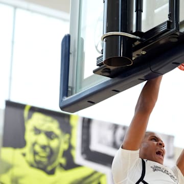 July 16, 2025; North Augusta, South Carolina, USA; MoKan Trent Perry (11) dunks the ball during the MoKan and Team Thad game at the Nike EYBL Peach Jam at Riverview Park Activities Center. MoKan won 69-61. Mandatory Credit: Katie Goodale - Augusta Chronicle/USA TODAY NETWORK