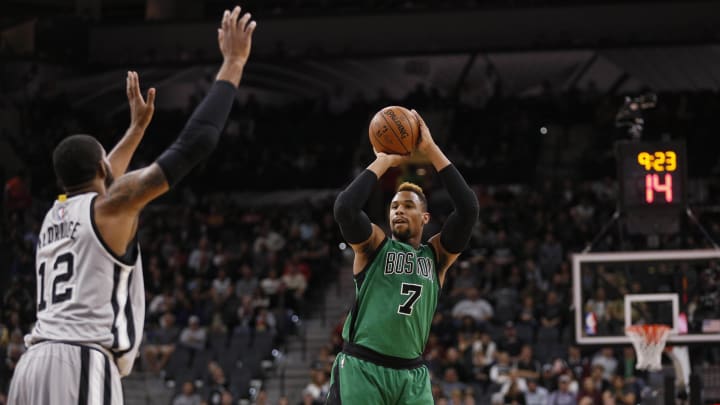 Dec 5, 2015; San Antonio, TX, USA; Boston Celtics center Jared Sullinger (7) shoots the ball over San Antonio Spurs power forward LaMarcus Aldridge (12) during the first half at AT&T Center. Mandatory Credit: Soobum Im-USA TODAY Sports