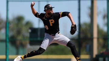 Feb 17, 2025; Bradenton, FL, USA;  Pittsburgh Pirates pitcher Yohan Ramirez (49) participates in spring training workouts at Pirate City. Mandatory Credit: Nathan Ray Seebeck-Imagn Images