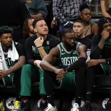 May 29, 2023; Boston, Massachusetts, USA; Boston Celtics forward Jayson Tatum (0) and guard Marcus Smart (36) and forward Blake Griffin (91) and guard Jaylen Brown (7) react from the bench during the fourth quarter against the Miami Heat in game seven of the Eastern Conference Finals for the 2023 NBA playoffs at TD Garden. Mandatory Credit: Winslow Townson-USA TODAY Sports