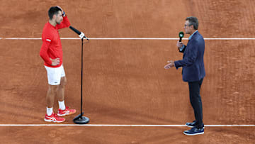 Mats Wilander interviewing Djokovic at the 2022 French Open