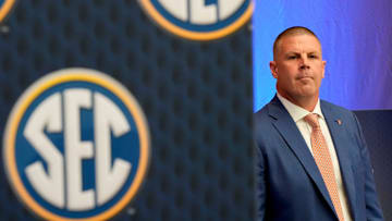 July 16, 2025; Atlanta, GA, USA; Florida head coach Billy Napier waits off stage to be introduced during SEC Media Days at the College Football Hall of Fame in Atlanta.