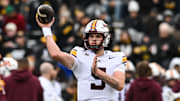 Oct 25, 2025; Iowa City, Iowa, USA; Minnesota Golden Gophers quarterback Drake Lindsey (5) throws a pass during warmups before the game against the Iowa Hawkeyes at Kinnick Stadium. Mandatory Credit: Jeffrey Becker-Imagn Images