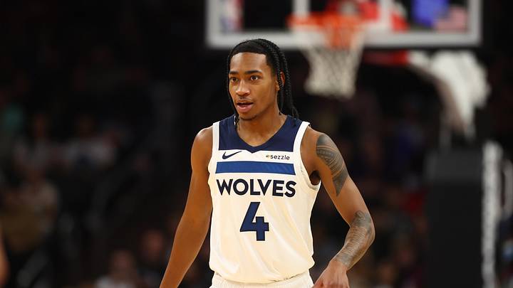Jan 29, 2025; Phoenix, Arizona, USA; Minnesota Timberwolves guard Rob Dillingham (4) against the Phoenix Suns at Footprint Center. Mandatory Credit: Mark J. Rebilas-Imagn Images