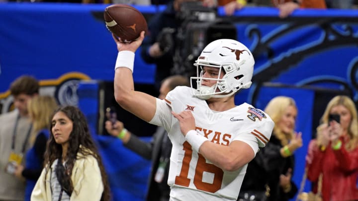 Jan 1, 2024; New Orleans, LA, USA; Texas Longhorns quarterback Arch Manning (16) warms ups before playing against the Washington Huskies in the 2024 Sugar Bowl college football playoff semifinal game at Caesars Superdome