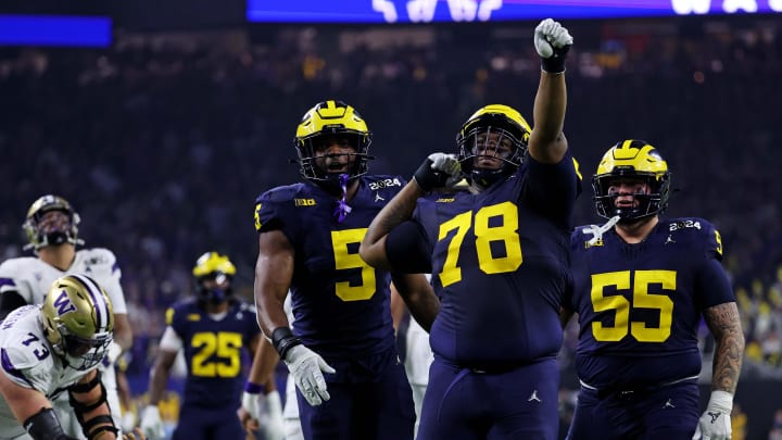 Jan 8, 2024; Houston, TX, USA; Michigan Wolverines defensive lineman Kenneth Grant (78) celebrates after a sack during the second quarter against the Washington Huskies in the 2024 College Football Playoff national championship game at NRG Stadium. Mandatory Credit: Troy Taormina-USA TODAY Sports