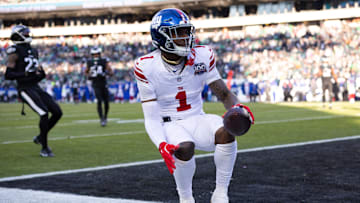 Jan 5, 2025; Philadelphia, Pennsylvania, USA; New York Giants wide receiver Malik Nabers (1) scores a touchdown against the Philadelphia Eagles during the fourth quarter at Lincoln Financial Field.  