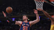 May 14, 2024; New York, New York, USA; New York Knicks center Isaiah Hartenstein (55) rebounds against Indiana Pacers forward Obi Toppin (1) during the second half during game five of the second round for the 2024 NBA playoffs at Madison Square Garden. Mandatory Credit: Vincent Carchietta-USA TODAY Sports