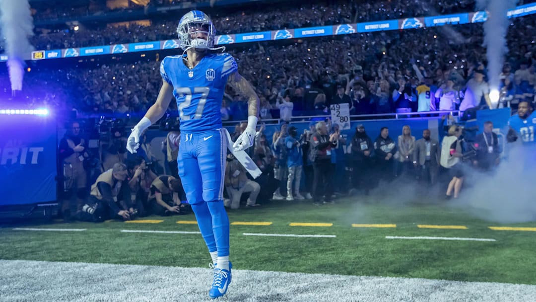 Jan 21, 2024; Detroit, Michigan, USA; Detroit Lions cornerback Chase Lucas (27) runs onto the field before a 2024 NFC divisional round game against the Tampa Bay Buccaneers at Ford Field.