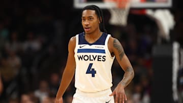 Jan 29, 2025; Phoenix, Arizona, USA; Minnesota Timberwolves guard Rob Dillingham (4) against the Phoenix Suns at Footprint Center. Mandatory Credit: Mark J. Rebilas-Imagn Images
