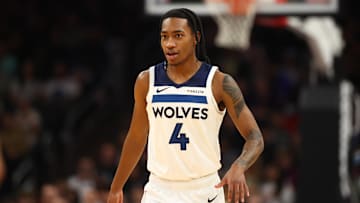 Jan 29, 2025; Phoenix, Arizona, USA; Minnesota Timberwolves guard Rob Dillingham (4) against the Phoenix Suns at Footprint Center. Mandatory Credit: Mark J. Rebilas-Imagn Images