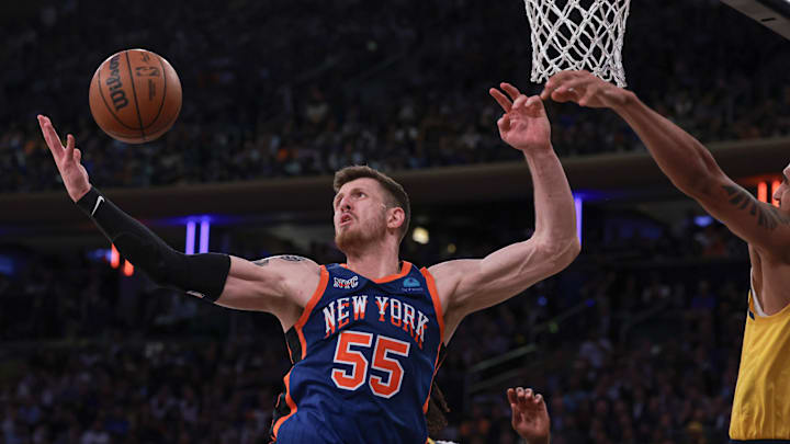 May 14, 2024; New York, New York, USA; New York Knicks center Isaiah Hartenstein (55) rebounds against Indiana Pacers forward Obi Toppin (1) during the second half during game five of the second round for the 2024 NBA playoffs at Madison Square Garden. Mandatory Credit: Vincent Carchietta-Imagn Images