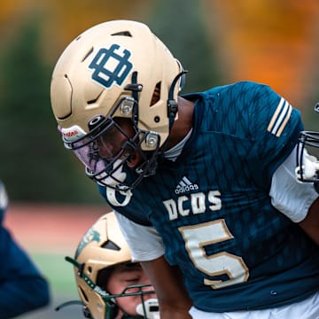 Detroit Country Day's Anthony Cartwright celebrates a defensive stop during a football against Monroe St. Mary Catholic Central on Saturday, Oct. 21, 2023.