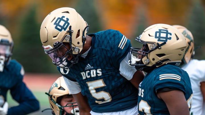 Detroit Country Day's Anthony Cartwright celebrates a defensive stop during a football against Monroe St. Mary Catholic Central on Saturday, Oct. 21, 2023.