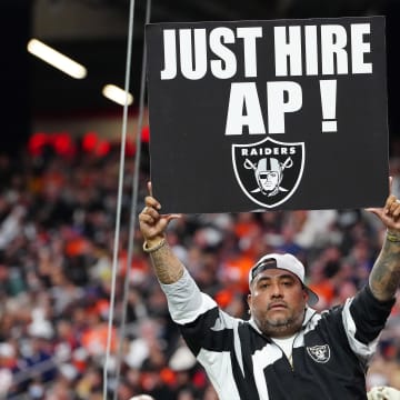 Jan 7, 2024; Paradise, Nevada, USA; A Las Vegas Raiders fan holds a sign during a game between the Raiders and the Denver Broncos during the second quarter at Allegiant Stadium. Mandatory Credit: Stephen R. Sylvanie-USA TODAY Sports