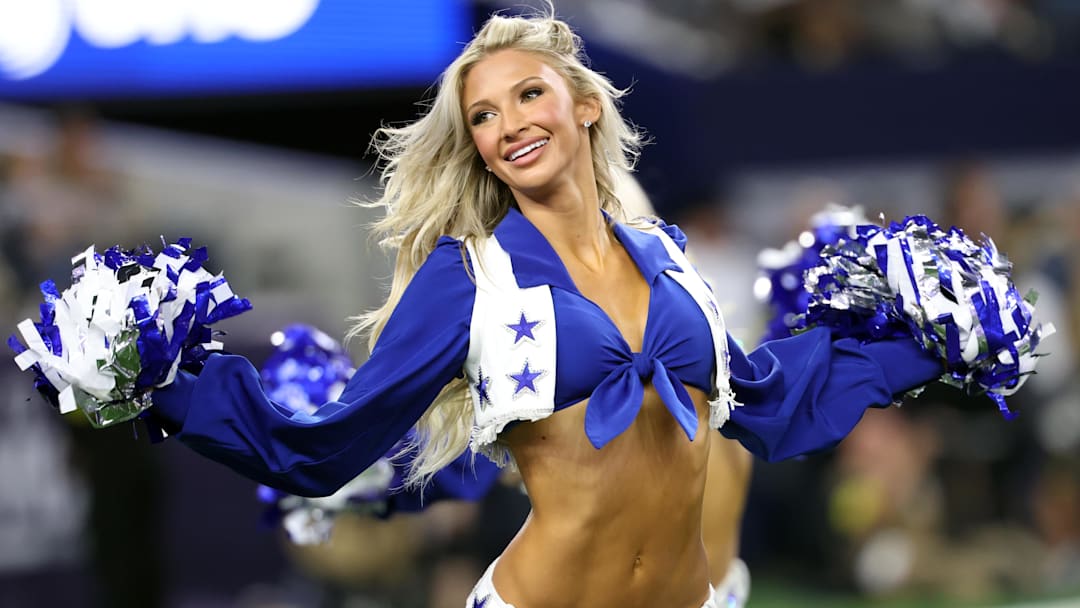 Nov 3, 2025; Arlington, Texas, USA; A Dallas Cowboys cheerleader performs in the second half against the Arizona Cardinals at AT&T Stadium. Nov 3, 2025; Arlington, Texas, USA; A Dallas Cowboys cheerleader performs in the second half against the Arizona Cardinals at AT&T Stadium.