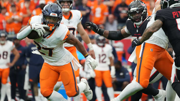 Denver Broncos running back J.K. Dobbins (27) runs during the second half against the Houston Texans at NRG Stadium. 