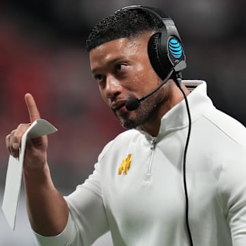 Jan 20, 2025; Atlanta, GA, USA; Notre Dame Fighting Irish head coach Marcus Freeman reacts against the Ohio State Buckeyes in the second half in the CFP National Championship college football game at Mercedes-Benz Stadium. 