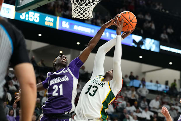 Baylor Bears guard Aijha Blackwell (33) has her shot blocked by Kansas State Wildcats forward Eliza Maupin (21).
