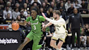 Nov 23, 2024; West Lafayette, Indiana, USA; Marshall Thundering Herd guard Dezayne Mingo (3) drives past Purdue Boilermakers guard Braden Smith (3) during the first half at Mackey Arena. Mandatory Credit: Marc Lebryk-Imagn Images