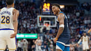 Minnesota Timberwolves guard Anthony Edwards celebrates while looking to the Los Angeles Lakers bench in the NBA Playoffs