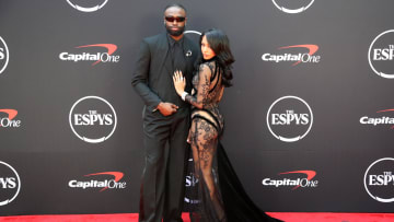 Jaylen Brown and Kysre Gondrezick pose on the red carpet. 