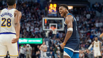 Minnesota Timberwolves guard Anthony Edwards celebrates while looking to the Los Angeles Lakers bench in the NBA Playoffs