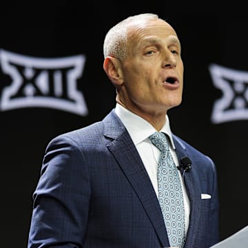 Oct 22, 2024; Kansas City, MO, USA; Big 12 Commissioner Brett Yormark speaks to media during Big 12 Women’s Basketball Media Day at T-Mobile Center. Mandatory Credit: Jay Biggerstaff-Imagn Images