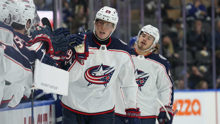 Dec 14, 2023; Toronto, Ontario, CAN; Columbus Blue Jackets forward Patrik Laine (29) gets congratulated after scoring against the Toronto Maple Leafs during the first period at Scotiabank Arena. Mandatory Credit: John E. Sokolowski-USA TODAY Sports