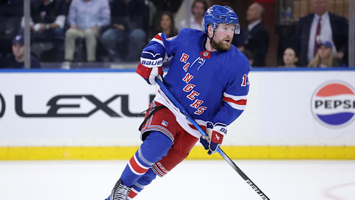 May 22, 2024; New York, New York, USA; New York Rangers left wing Alexis Lafreniere (13) skates against the Florida Panthers during the third period of game one of the Eastern Conference Final of the 2024 Stanley Cup Playoffs at Madison Square Garden. Mandatory Credit: Brad Penner-Imagn Images May 22, 2024; New York, New York, USA; New York Rangers left wing Alexis Lafreniere (13) skates against the Florida Panthers during the third period of game one of the Eastern Conference Final of the 2024 Stanley Cup Playoffs at Madison Square Garden. Mandatory Credit: Brad Penner-Imagn Images