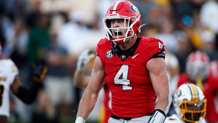 Georgia tight end Oscar Delp (4) celebrates after scoring a touchdown during the second half of a NCAA college football game against Missouri in Athens, Ga., on Saturday, Nov. 4, 2023. Georgia won 30-21.